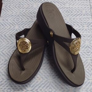 CROCS Brown Sandals Plastic with Gold Accents